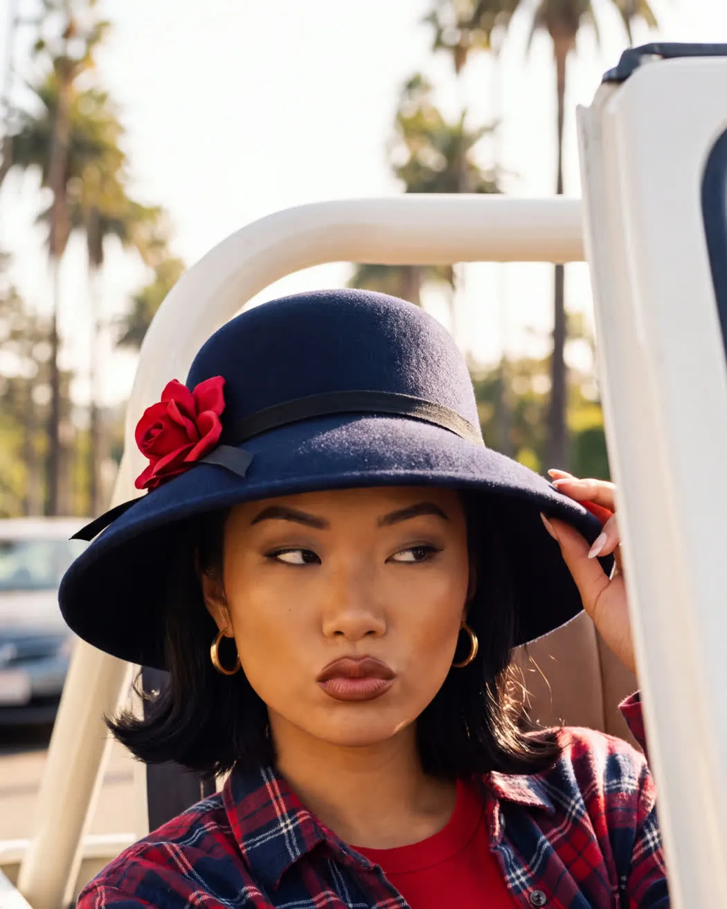 a Clueless-style convertible beauty film still with a warm 90s grade