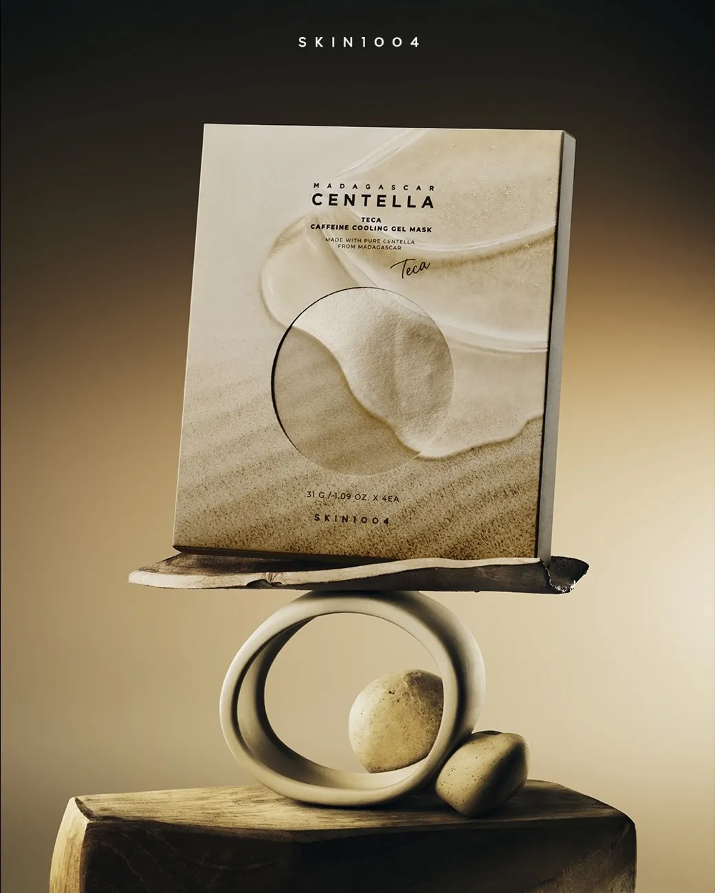 A Madagascar-inspired skincare set on sculptural sandstone.