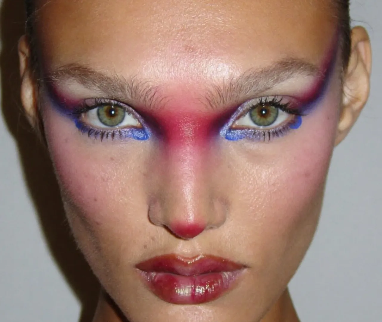 An editorial AI beauty close-up with visible pores and real skin texture.