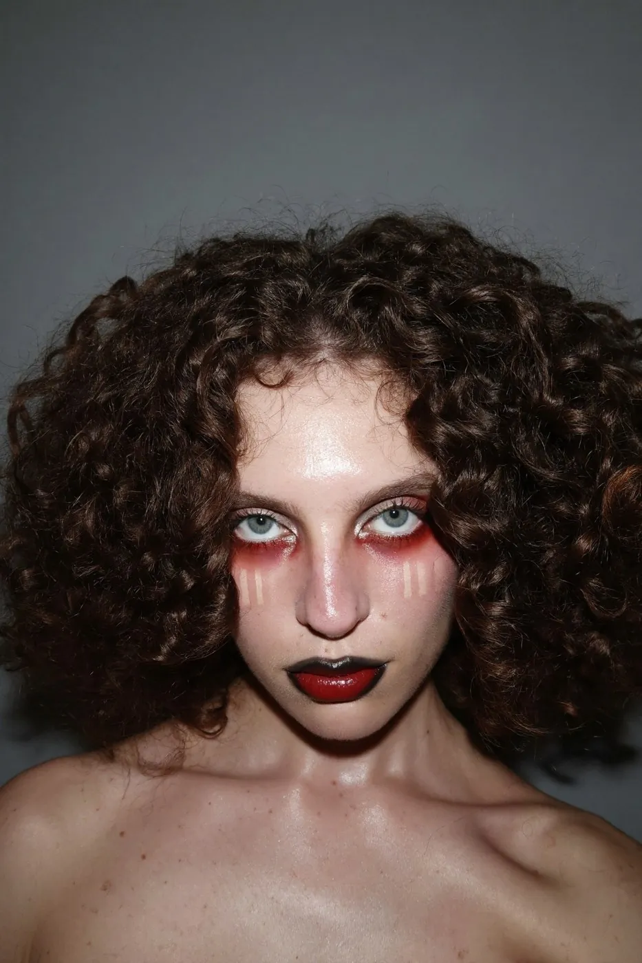 An editorial AI lip close-up with gloss gathering unevenly and fine lip lines.